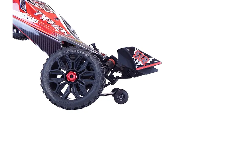 A T-Bone Racing wheelie bar installed on the rear of an ARRMA Typhon 3S RC buggy against a white background.