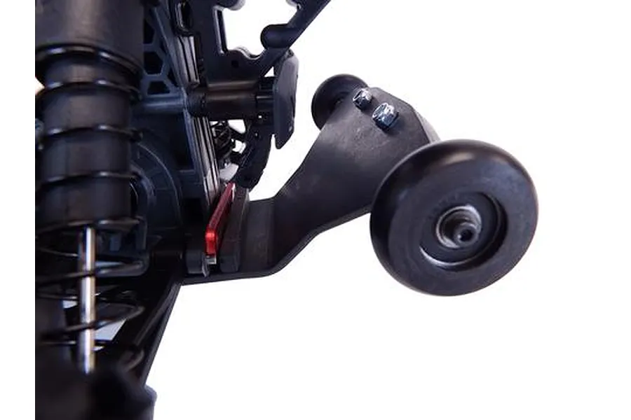 Close-up of a T-Bone Racing wheelie bar installed on the rear of an ARRMA Typhon 3S RC car, showing the black plastic mount and wheel.