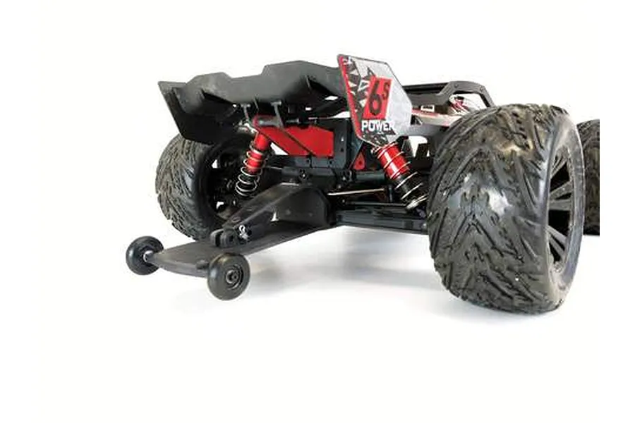 Rear view of an ARRMA RC vehicle equipped with a T-Bone Racing black wheelie bar installed on the chassis.