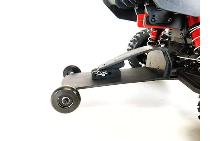 A T-Bone Racing wheelie bar installed on the rear of an ARRMA Typhon RC car, featuring a black plastic plate and two small wheels.