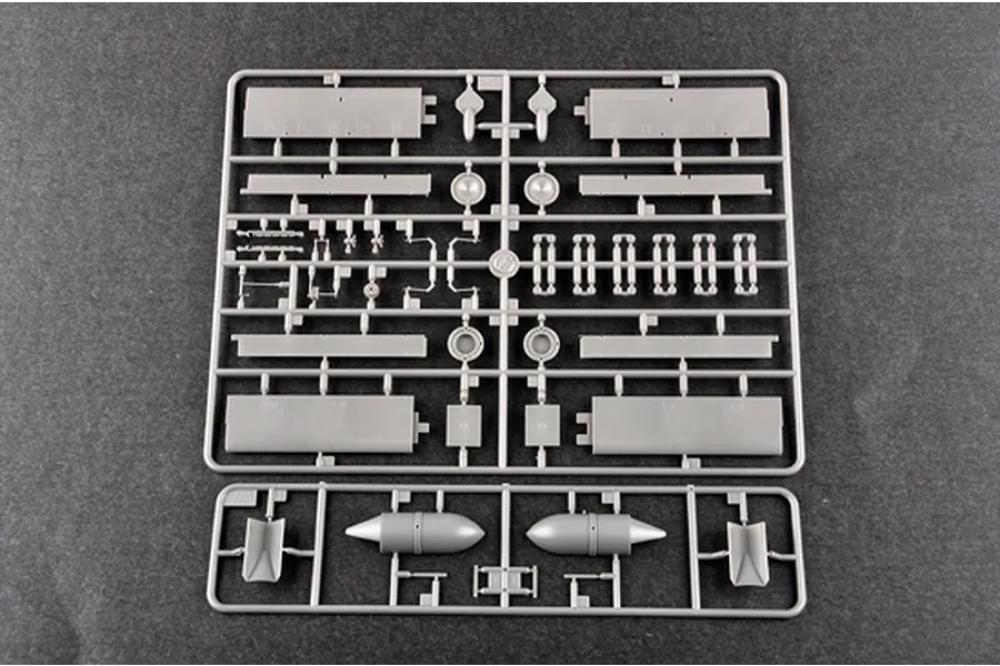 Grey plastic model kit sprue frames containing aircraft parts for a Trumpeter Junkers Ju-87D Stuka model.