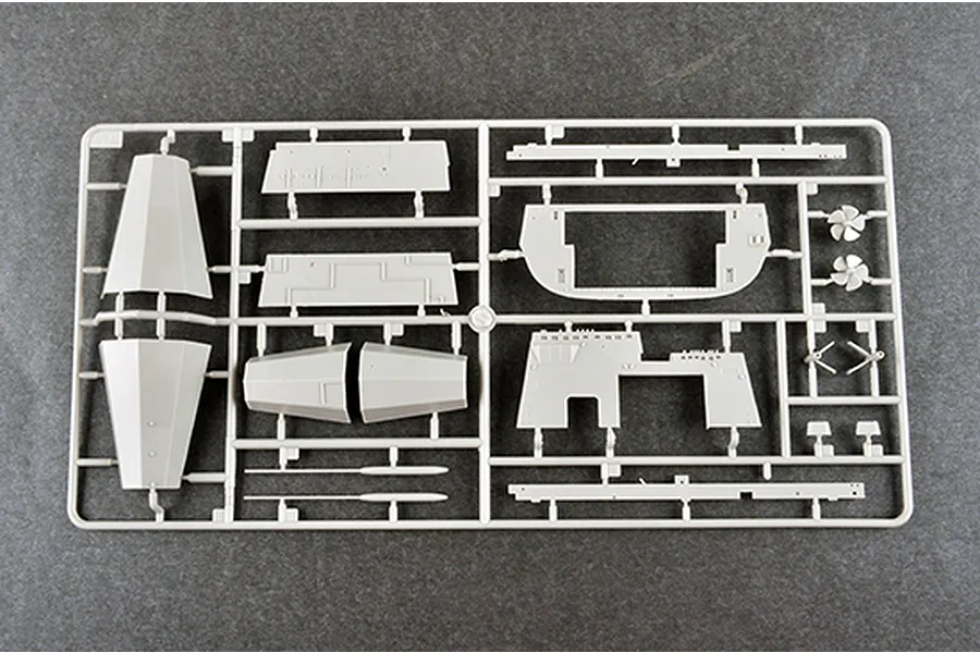 A grey plastic model kit sprue containing various ship parts for a 1/350 scale USS New York LPD-21 model.
