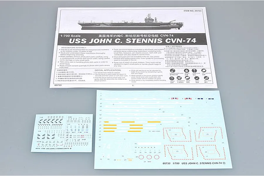 Instruction manual and two decal sheets for a 1/700 scale Trumpeter USS John C. Stennis CVN-74 model kit.