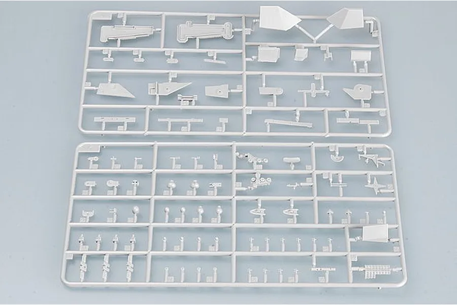 Two grey plastic model kit sprues containing various small parts for a 1/700 scale ship model.