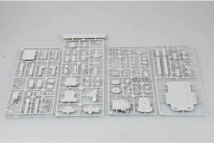 Four grey plastic model kit sprues laid out on a plain white background, containing various ship parts for a 1/350 scale model.