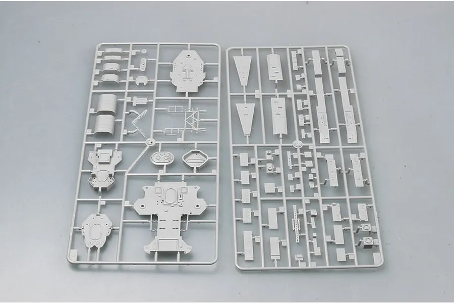 Two grey plastic model kit sprues containing various ship parts for the Trumpeter 1/350 Admiral Graf Spee model.