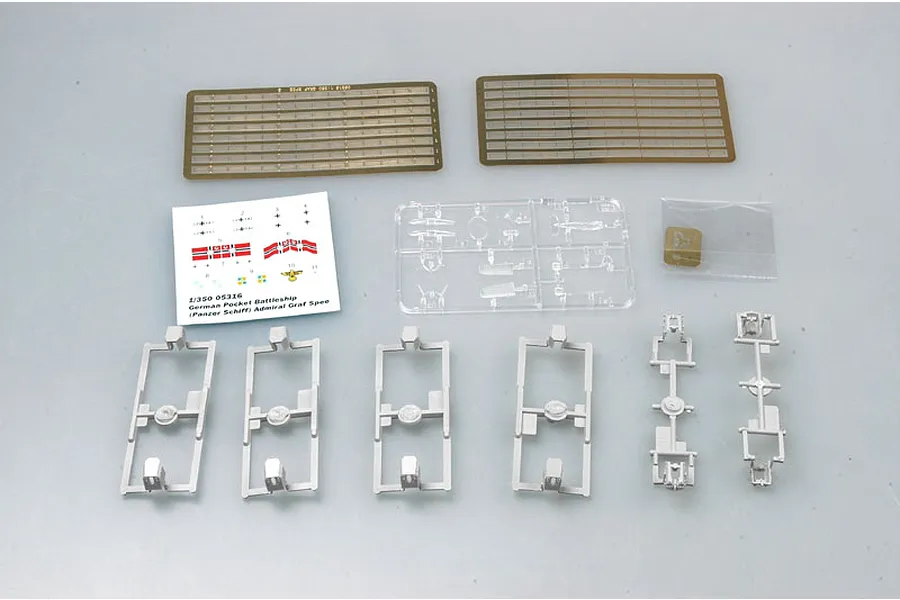 Trumpeter 1/350 Admiral Graf Spee model kit parts including photo-etched brass sheets, clear plastic sprue, decal sheet, and grey plastic components.