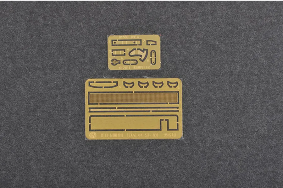 Two photo-etched brass detail sheets for a Trumpeter 1/35 scale model kit on a grey felt background.