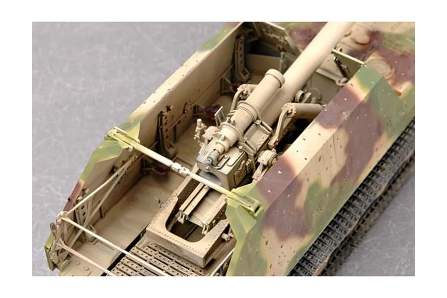 High angle close-up of a 1/35 scale model German Geschutzwagen Tiger self-propelled gun showing the open fighting compartment and large artillery piece.