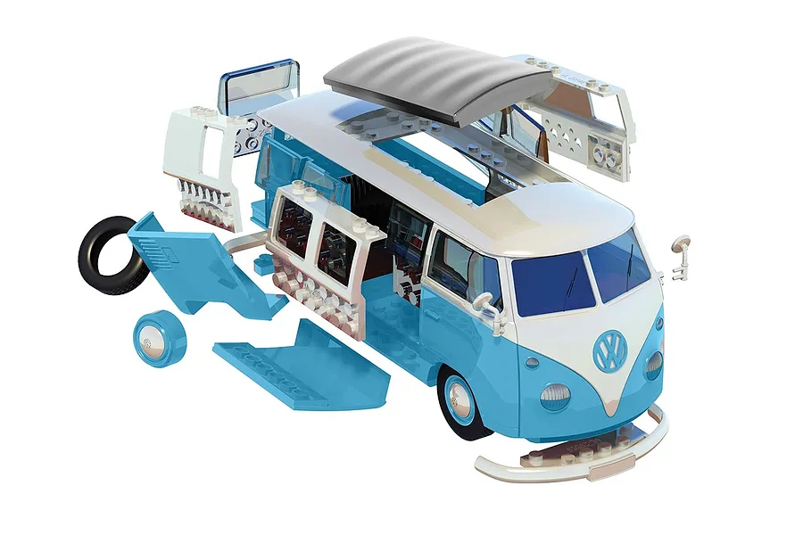 An exploded view of an Airfix Quickbuild Volkswagen Kombi Camper Van model kit in blue and white, showing individual plastic components.