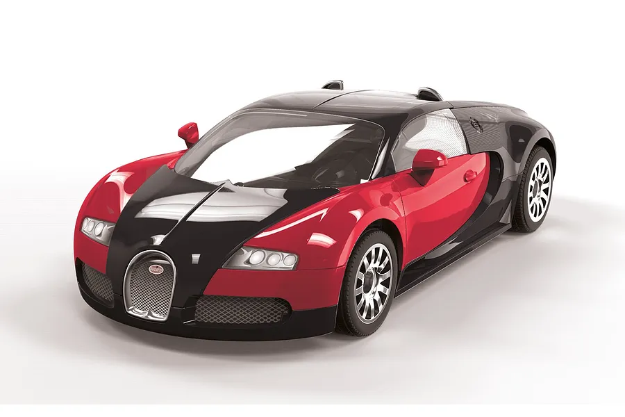 A studio shot of a red and black Bugatti Veyron 16.4 model car on a white background.