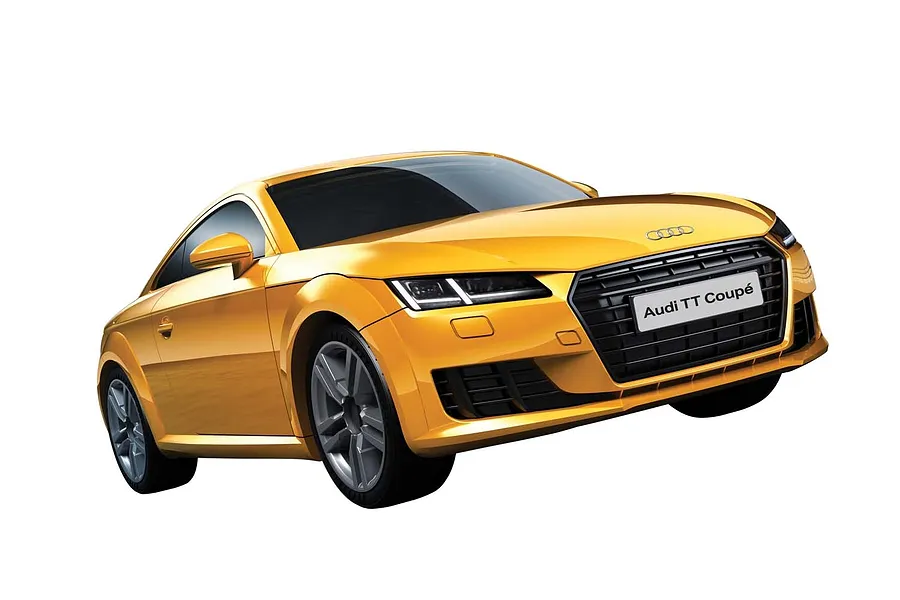 A studio shot of a yellow Audi TT Coupe model car, angled to show the front and side profile against a white background.