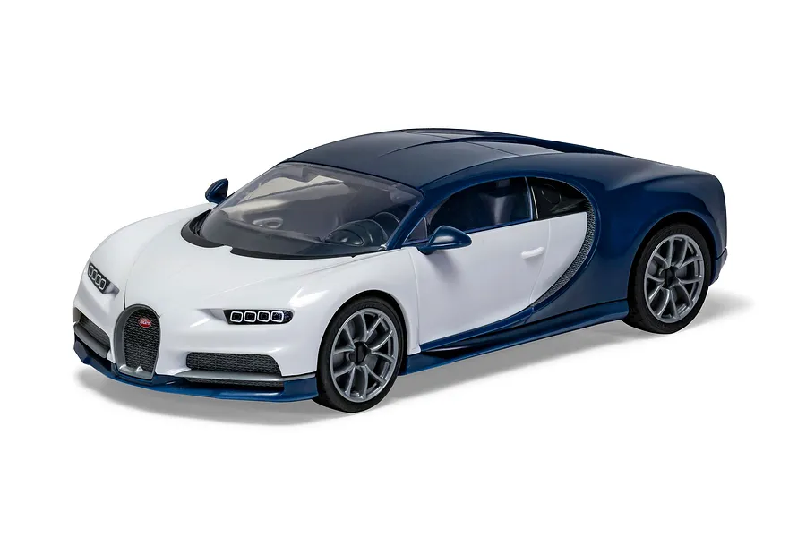A studio shot of an assembled Airfix Quickbuild Bugatti Chiron model car in white and dark blue, viewed from a high front three-quarter angle.