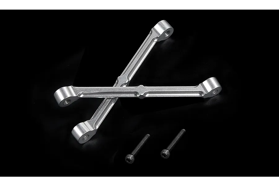 Two silver aluminium RC shock tower braces arranged in an X shape with two black socket head screws below them on a black background.
