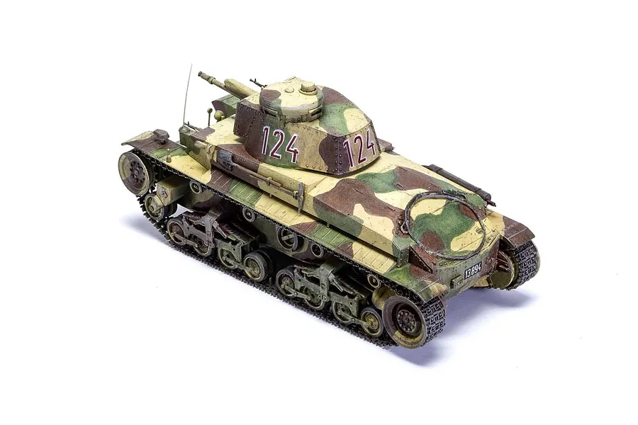 A high-angle view of a finished 1/35 scale Pz.Kpfw.35(t) light tank model with a camouflage paint scheme and the number 124 on the turret.