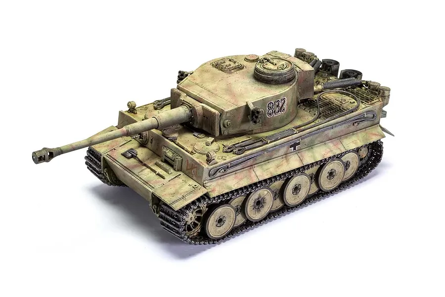 A fully assembled and painted 1/35 scale Tiger 1 tank model with camouflage paint and the number 823 on the turret.