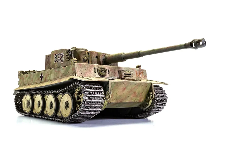 A fully assembled and painted 1/35 scale Tiger 1 tank model with camouflage paint, featuring the number 823 on the turret, set against a white background.
