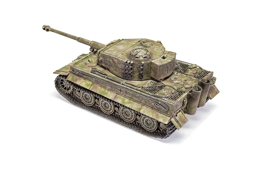 A fully assembled and painted 1/35 scale model of a German Tiger I tank with camouflage paint and the number 112 on the turret.