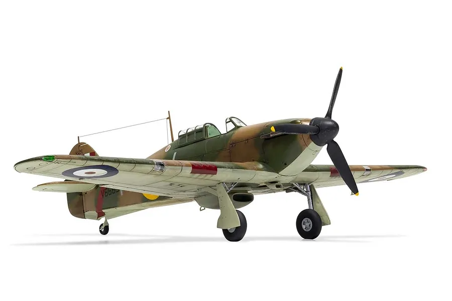 A completed 1/48 scale plastic model of a Hawker Hurricane Mk.1 fighter aircraft, painted in a camouflage pattern with RAF markings.