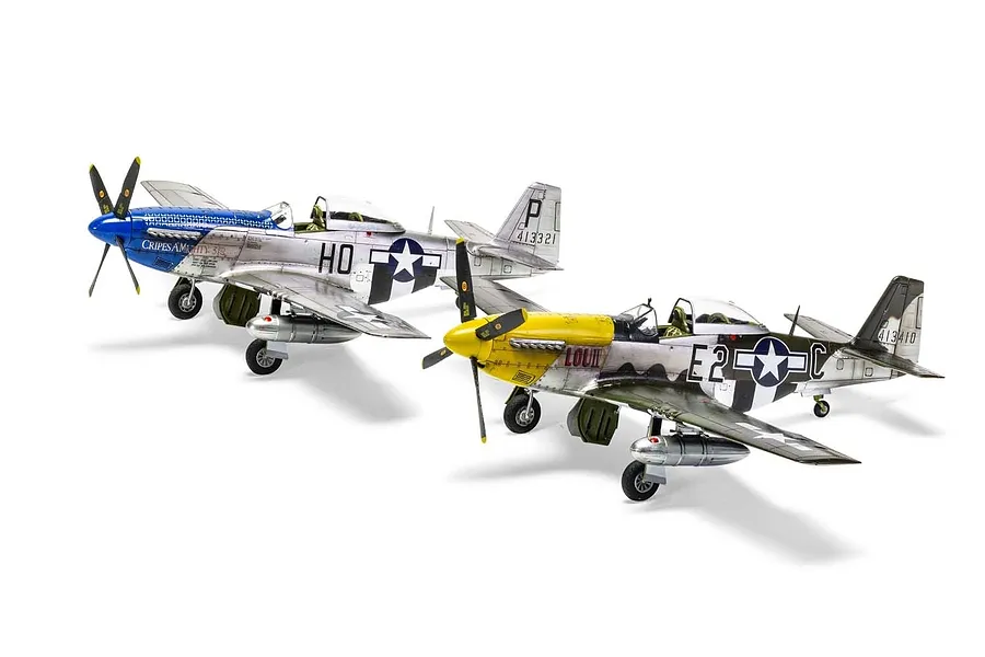 Two assembled and painted 1/48 scale North American P-51D Mustang model aircraft on a white background.