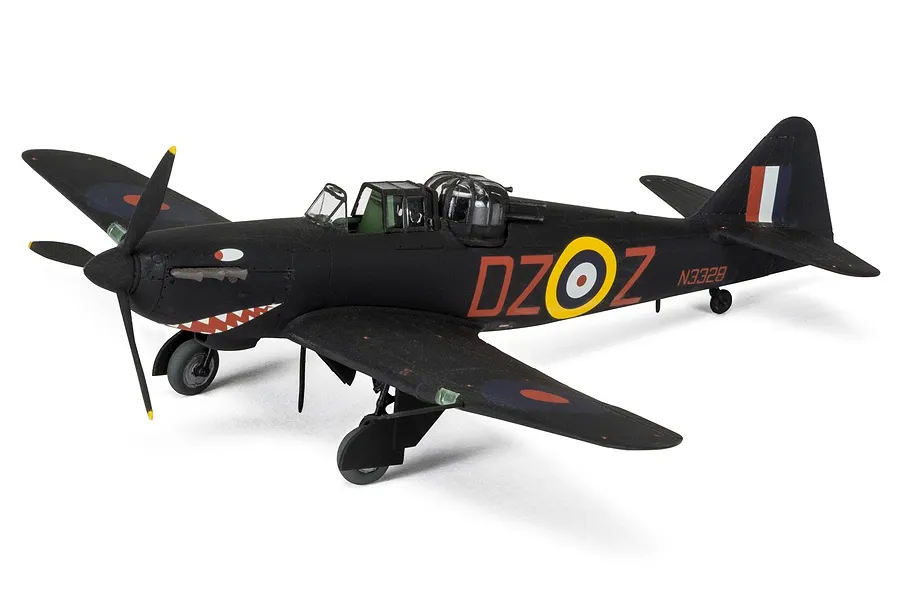 A fully assembled and painted 1/72 scale plastic model of a Boulton Paul Defiant fighter aircraft in black livery with RAF markings.
