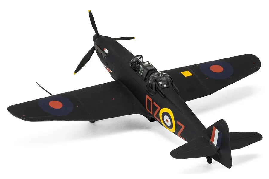 A 1/72 scale plastic model of a Boulton Paul Defiant fighter aircraft, painted in a black night-fighter scheme with RAF roundels and markings.