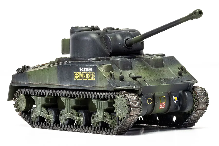 A fully assembled and painted 1/72 scale plastic model of a Sherman Firefly tank, featuring olive drab camouflage and 'BELVEDERE' markings.