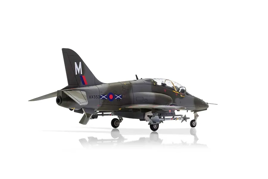 A completed 1/72 scale plastic model of a BAE Hawk T.Mk.1A trainer aircraft, viewed from the rear three-quarter angle against a white background.