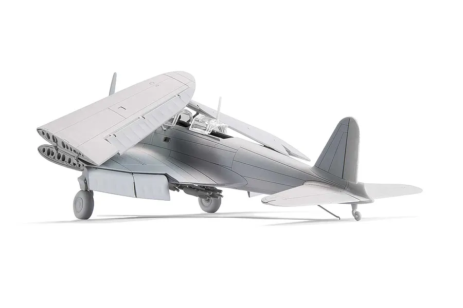 A 1/72 scale plastic model of a Nakajima B5N2 Kate bomber with folded wings, shown in grey primer against a white background.