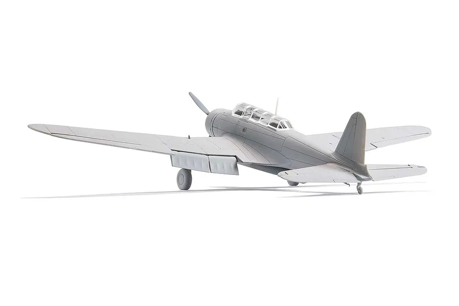 A grey, unpainted plastic model of a Nakajima B5N2 Kate bomber seen from the rear three-quarter angle against a white background.