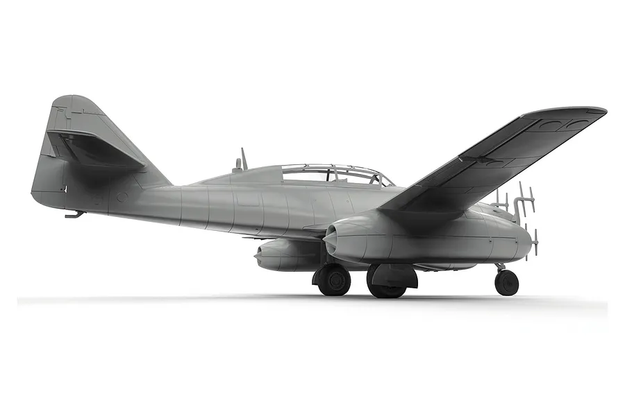 A grey, unpainted plastic model of a Messerschmitt Me 262 jet fighter seen from the rear three-quarter angle against a white background.