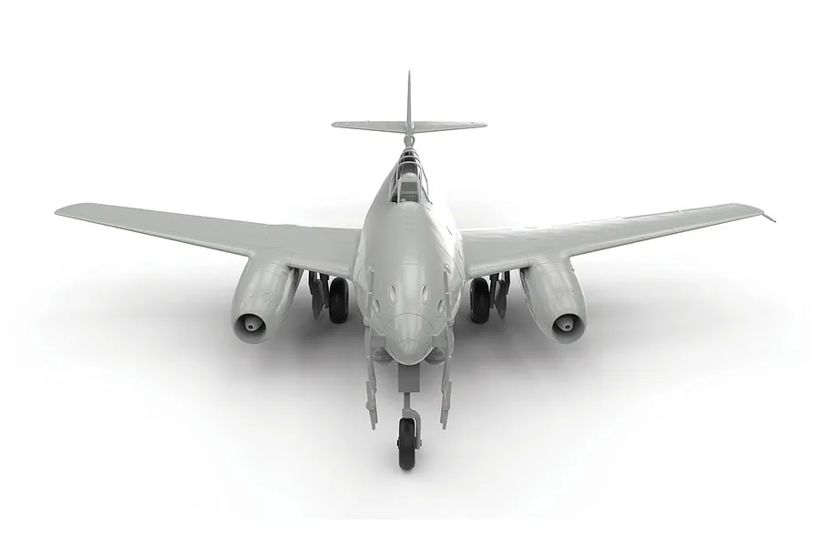 Front view of an unpainted grey plastic model kit of a Messerschmitt Me 262 jet fighter, showing the fuselage, wings, and landing gear.