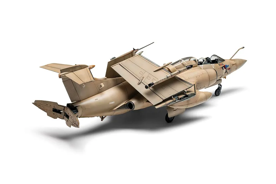 A completed 1/72 scale plastic model of a tan RAF Blackburn Buccaneer S.2 attack aircraft, shown from a rear three-quarter angle.