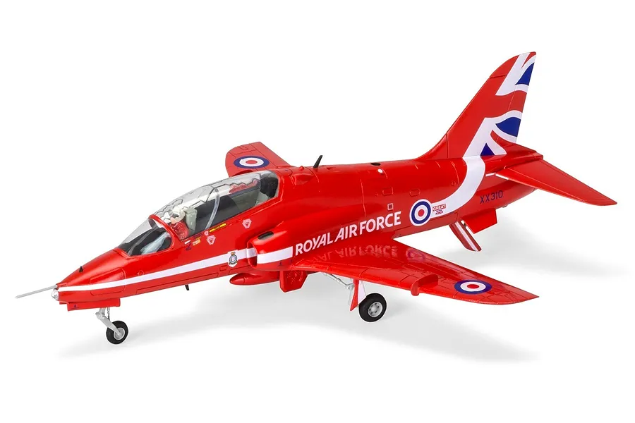 A fully assembled 1/72 scale plastic model of a Red Arrows RAF Hawk trainer jet, painted in iconic red with Union Jack tail markings.