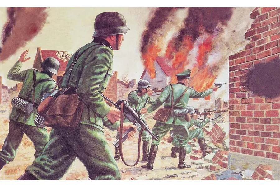 An illustration of WWII German soldiers in green uniforms advancing through a war-torn, burning village with brick buildings.