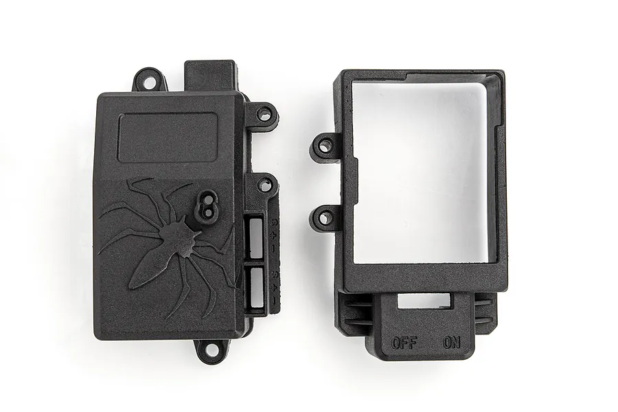 Two black plastic RC receiver box components, one with a spider logo and one with an ON/OFF switch cutout, isolated on a white background.