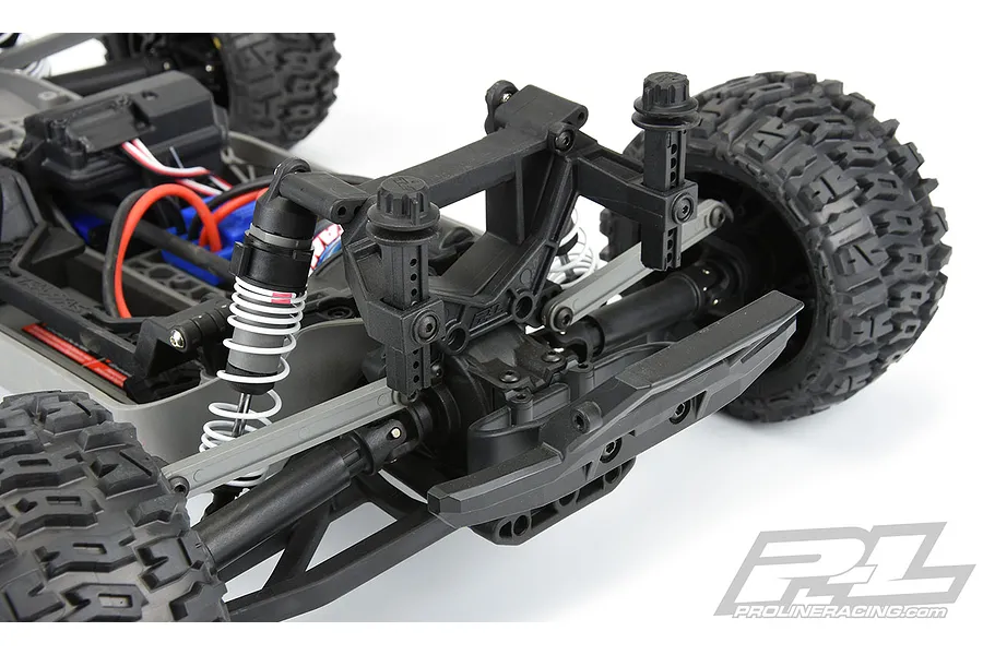 A close-up view of the rear section of an RC car chassis featuring Pro-Line extended body mounts installed.