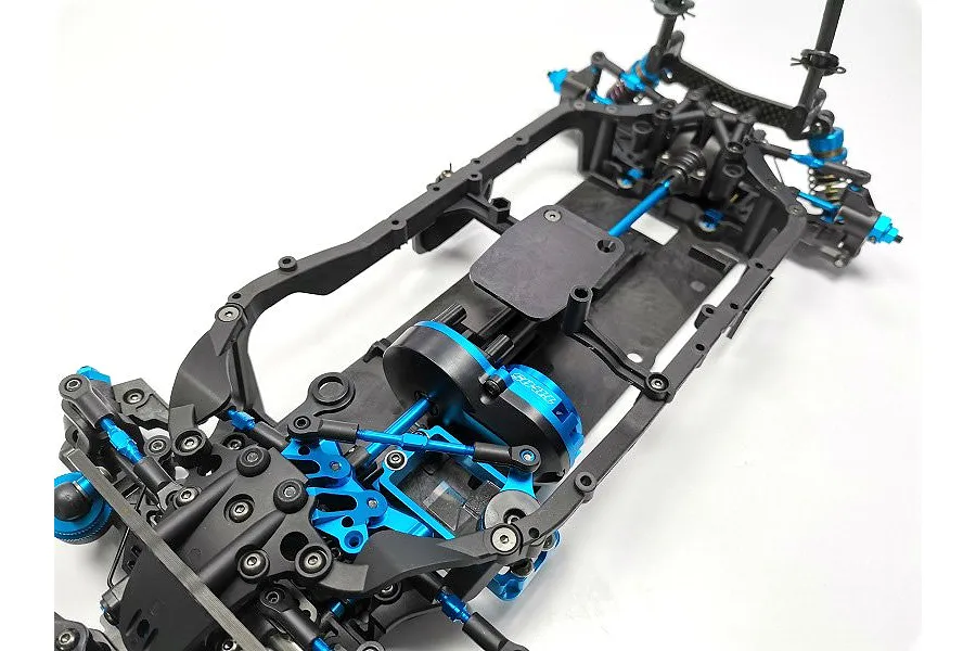 Top-down view of a Tamiya TB-05R RC touring car chassis featuring a black frame with blue anodized aluminum components.