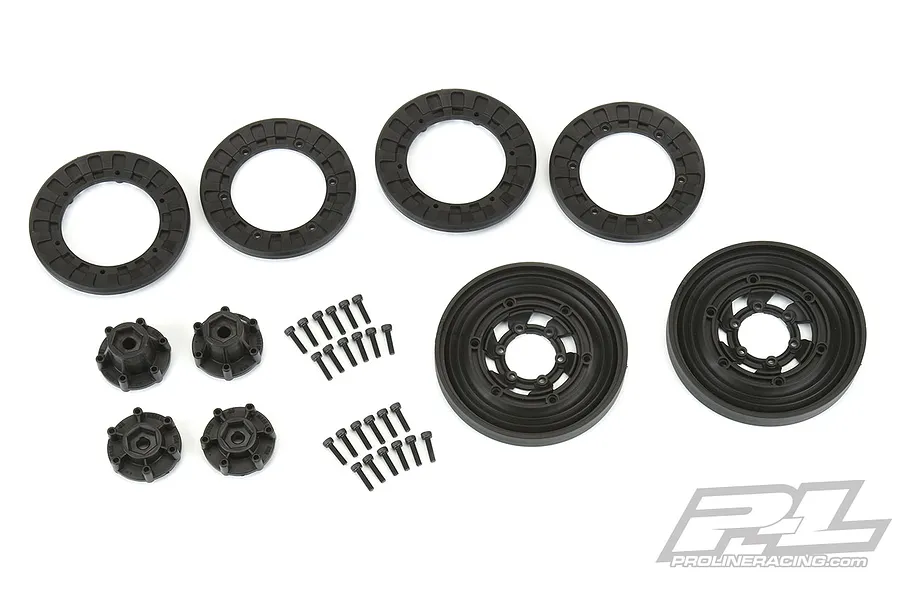 Pro-Line 2.6 inch Vice CrushLock beadlock rock crawler rim kit components including two rims, four beadlock rings, four hex hubs, and mounting screws.