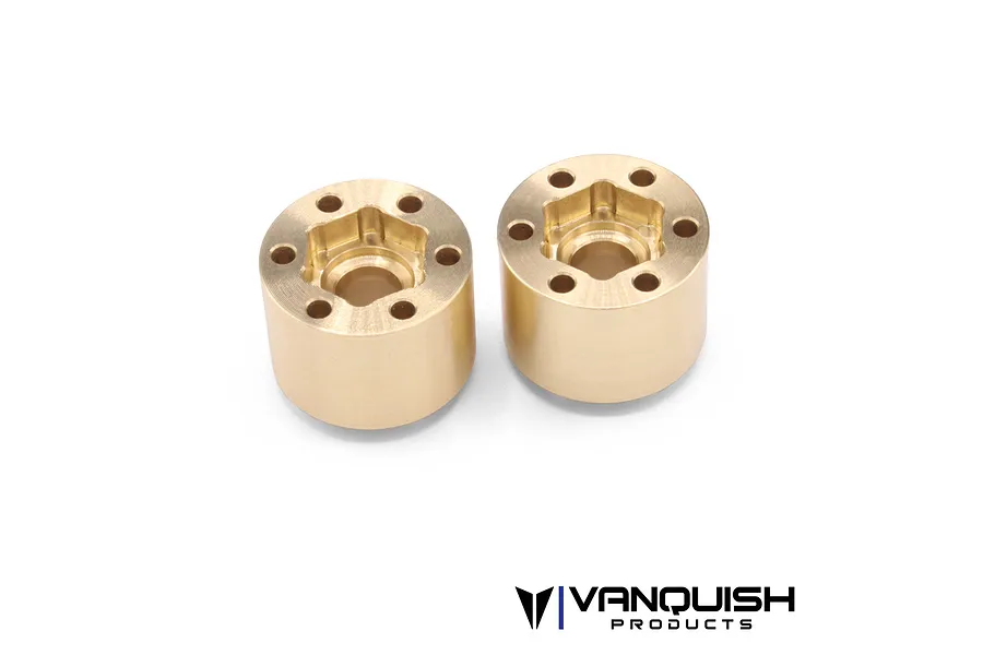 Two Vanquish brass SLW 600 beadlock wheel hex hubs shown from a top-down angle against a white background.