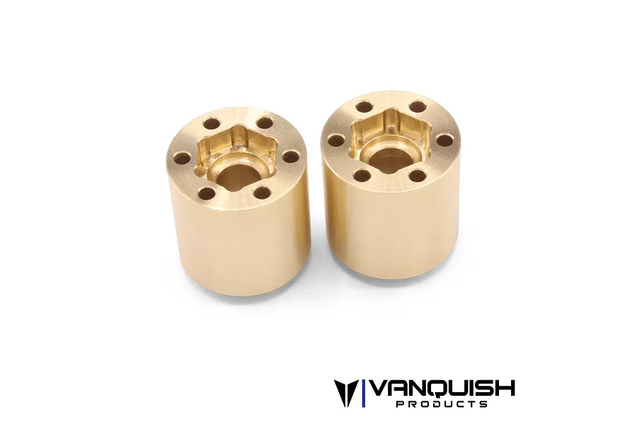 Two Vanquish brass SLW 725 beadlock wheel hex hubs shown from an angled top-down perspective against a white background.