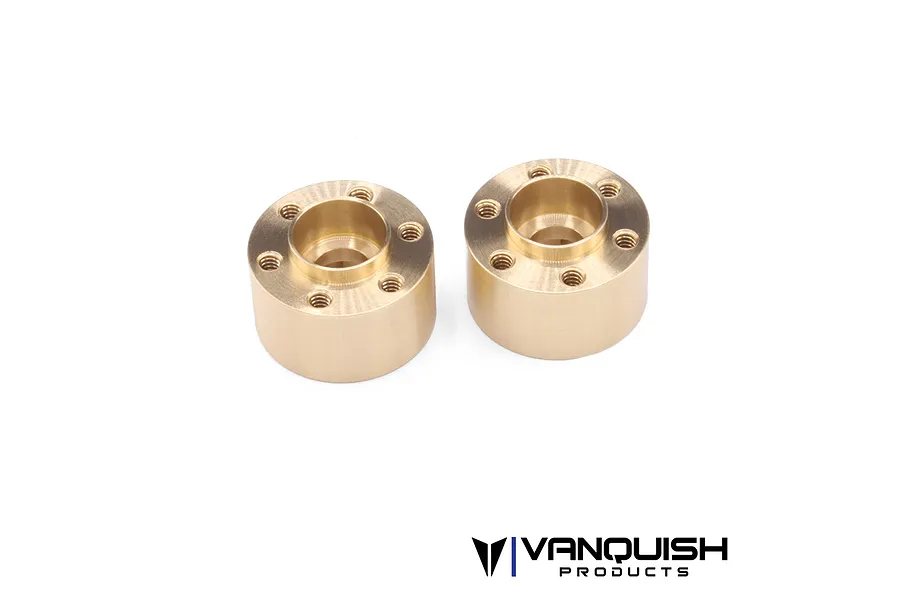 Two Vanquish brass SLW 475 beadlock wheel hex hubs shown from an angled top-down perspective against a white background.