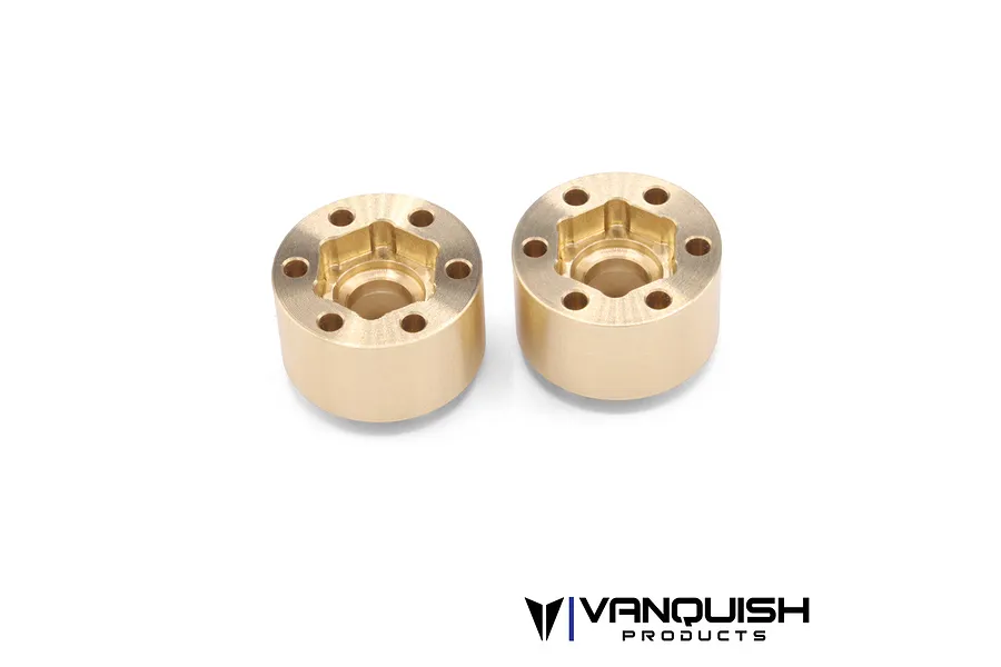 Two Vanquish brass SLW 475 beadlock wheel hex hubs shown from an angled top-down perspective against a white background.