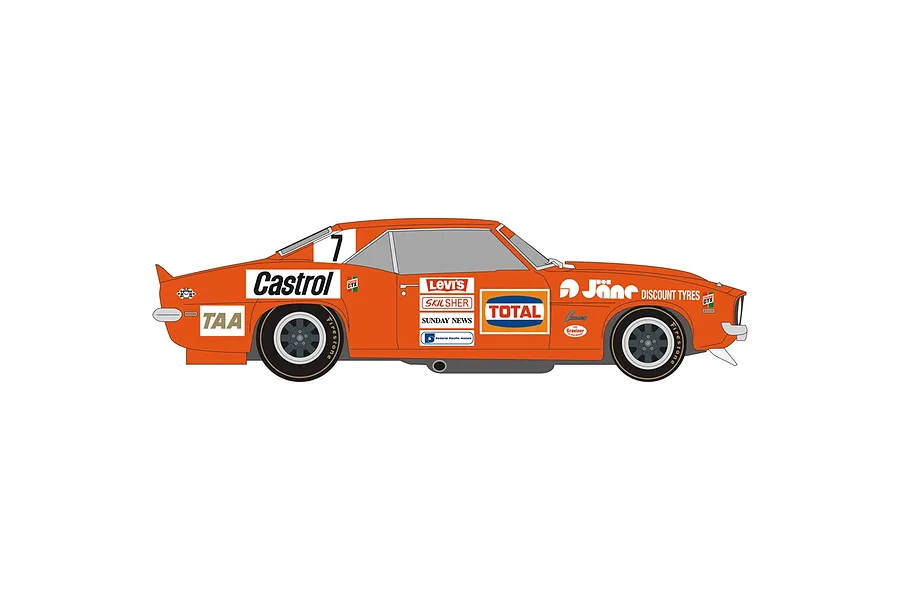 Side profile of an orange Scalextric 1/32 scale 1972 ZL1 Camaro slot car featuring various racing sponsor decals.