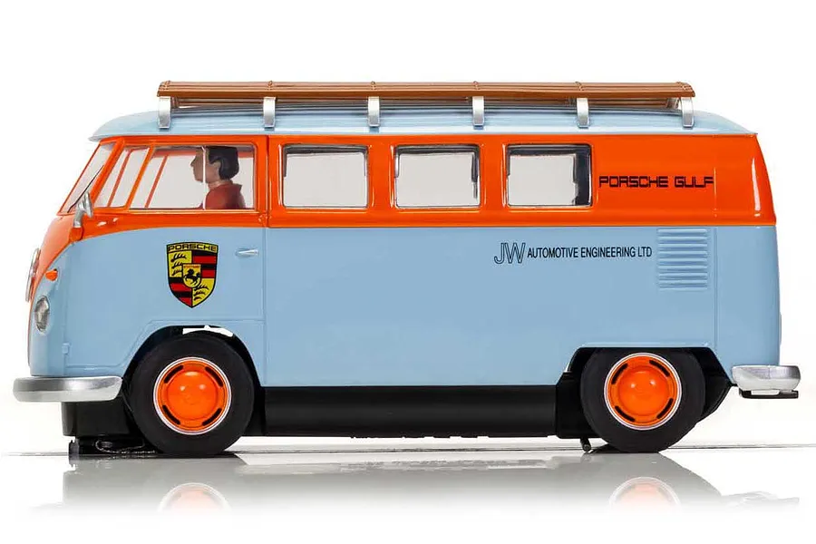 Side view of a Scalextric 1/32 scale VW T1B Microbus slot car in Gulf livery with orange and light blue paint and a roof rack.