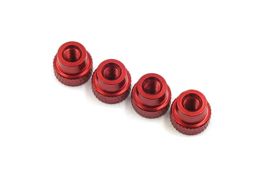 Four red anodized aluminium knurled setup system lock nuts arranged in a row against a white background.
