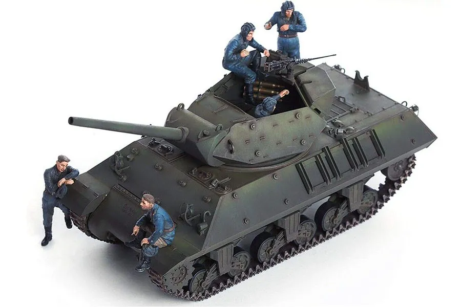 A 1/35 scale plastic model of a USSR M10 tank with crew figures, painted in olive drab with dark blue uniforms.
