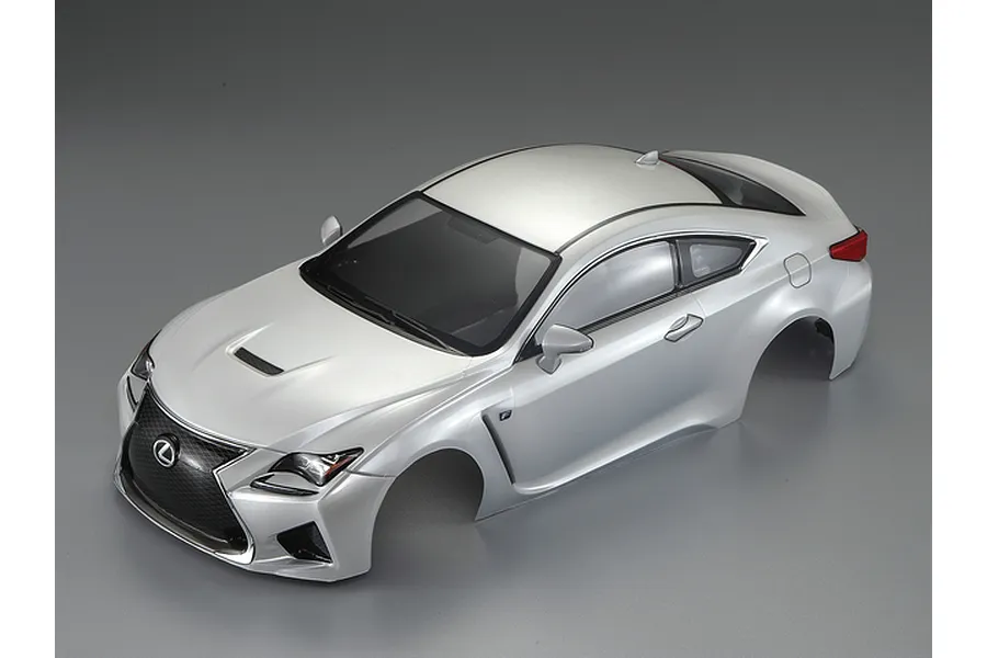 A pearl white 1/10 scale Lexus RC F RC car body shell, viewed from a high angle against a grey background.