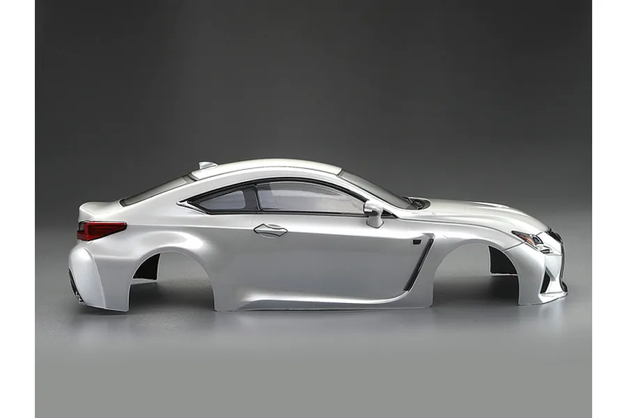 Side profile of a pearl white Killerbody Lexus RC F 1/10 scale RC car body shell on a grey background.