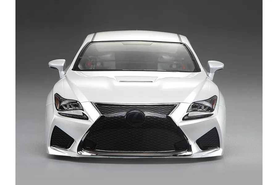 Front view of a 1/10 scale pearl white Lexus RC F RC car body shell with a detailed black spindle grille and headlights.
